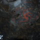 Photo of the Pinwheel painting, with a crevice stuffed with quid shown at lower left above the 10-cm scale.